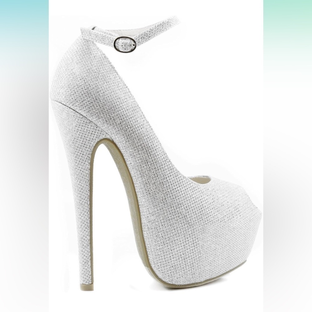 Stiletto high heels platform ankles straps. Sparkly canvas.